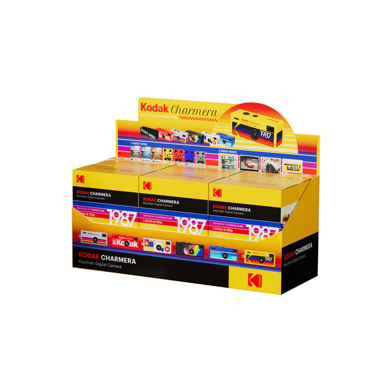 Kodak Charmera display box with multiple boxes stacked on a white background