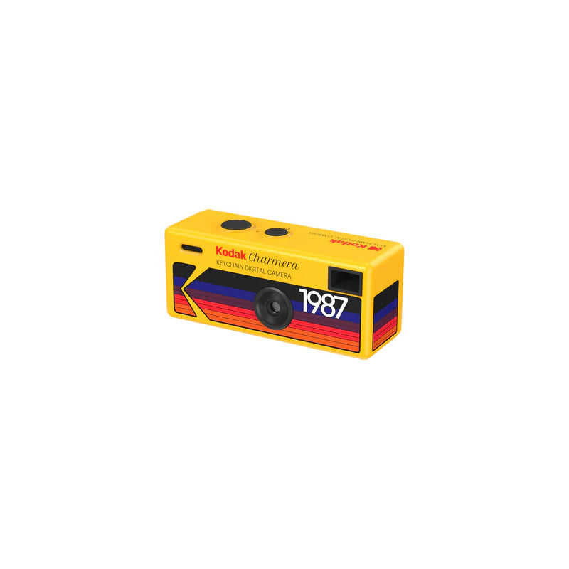 Yellow vintage camera packaging with '1987' and Kodak branding on a white background