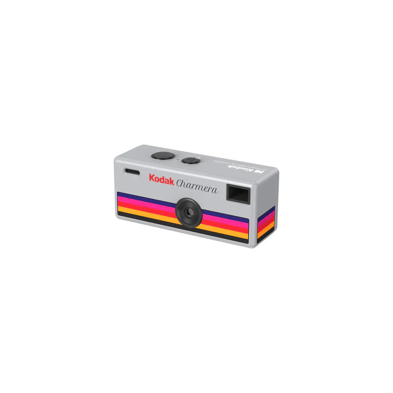 Kodak Charmera instant camera with colorful stripe on a white background